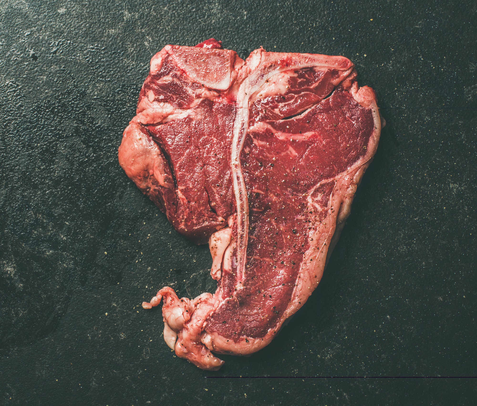 Close-up of fresh raw beef meat porterhouse steak